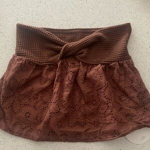 It's an adorable Beachy top that fits xs or xxs